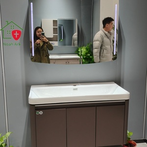 Mueble de Baño de Madera Maciza Marrón de Tres Puertas, Resistente al Agua, con Encimera Blanca, Lavabo de Cerámica, Espejo Arqueado y Luz LED - Product Image 1