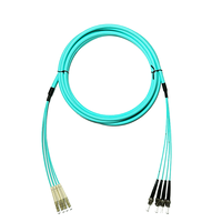 LSZH bahan 5.0mm Diameter luar lapis baja multifode 4-core 10G serat optik Jumper LC/SC/FC/ST