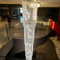 Lustre de luxe en cristal K9, grand et long, avec télécommande, éclairage personnalisable pour villas, hôtels et projets d'escaliers