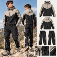 Ensemble de survêtement d'hiver pour homme, coupe-vent imperméable mi-lourd, personnalisé OEM/ODM, avec fermeture éclair, en polyester/nylon, pour la gym et le fitness