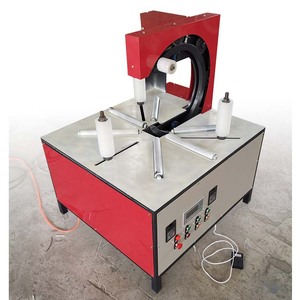 Machine d'emballage en spirale pour tuyaux / Machine d'emballage et de conditionnement de bobines de fil d'acier - Product Image 1