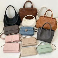 Assortiment de sacs à main de marque haut de gamme d'occasion avec une large sélection codée pour un choix personnalisé