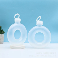 Bouteille en plastique PP portable de 500 ml (16 oz) en forme de donut, résistante aux hautes températures, pour jus, café, lait, thé et autres boissons.