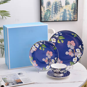 Service de table 4 pièces en porcelaine fine avec bols, assiettes, tasses et soucoupes – Motif porte-bonheur et joyeux pour usage familial et cadeaux d'affaires - Product Image 2