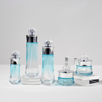 Ensemble de soins de la peau en verre de luxe, flacons dégradés bleus de 40 à 120 ml, pots à crème avec bouchon à bille doré unique pour lotion et fond de teint