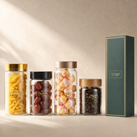 Bouteilles en verre transparent en gros avec couvercles en bois noir et or, logo personnalisé pour le stockage d'aliments, de bonbons, de grains de café, de capsules