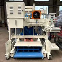 Machine mobile de fabrication de blocs de béton QMJ10-30, pour blocs creux, à ponte, mobile, automatique, à pression hydraulique, avec moteur