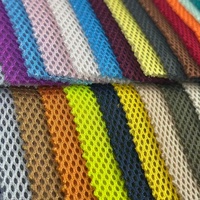 Tissu en maille de polyester doux et élastique, respirant, pour genouillères de sport, attelles de poignet, équipement de protection, matière première en gros en stock