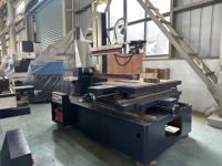 DK7763 mesin pemotong kawat Edm Cnc tipe Flushing cairan kerja berbasis air