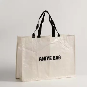 Sac de voyage écologique personnalisé en nylon réutilisable avec logo, tissu laminé en PP tissé, couleur personnalisée, fermeture éclair, poignée d'épaule - Product Image 1