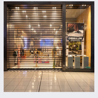 Meilleures Volets Roulants Électriques Modernes Transparentes en Polycarbonate, Étanches et Résistantes au Vent, pour Appartements et Supermarchés 1