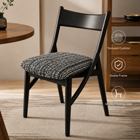 Chaise de salle à manger moderne avec coussin texturé et structure noire stable pour la maison et les restaurants