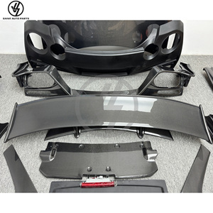 Kit carrosserie style Top Secret en fibre de carbone semi-brillante Carracing, comprenant pare-chocs, spoiler, capot et jupes latérales, avec pose sous vide pour R35 GTR - Product Image 6