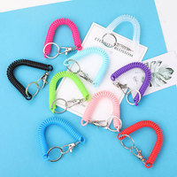 Vente en gros de porte-clés corde à ressort coloré corde à main anti-perte ligne téléphonique bobine de poignet fermoir cordon porte-clés extensible en spirale