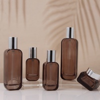 Ensemble de flacons cosmétiques en verre vides avec bouchon argenté, pompe à lotion rechargeable, format voyage, vente en gros, fournitures d'emballage personnalisées avec logo