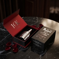 Boîte cadeau de parfum magnétique de luxe, logo en relief or rose, emballage en carton rigide noir mat avec insert en mousse EVA personnalisé