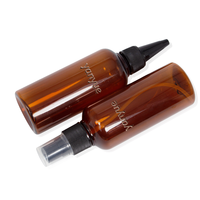 Bouteille en plastique ronde transparente personnalisable de 100 ml en PET pour spray corporel, nettoyant visage et huile essentielle avec couleur personnalisée