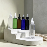 Bouteille vide en plastique pour huile capillaire, forme cylindrique, avec applicateur à pression, embout fin givré et bouchon torsadé, personnalisable avec logo, vente en gros