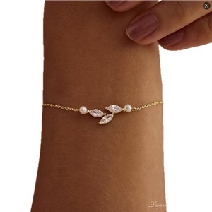 สร้อยข้อมือเพทายรูปใบไม้หรูหราของขวัญทอง18K สำหรับผู้หญิง - Product Image 6