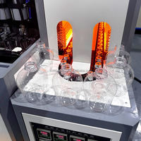 Machine de fabrication de bouteilles en plastique pour animaux de compagnie semi-automatique de petite capacité, machines de soufflage de plastique pour petites bouteilles