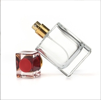 Paquet de bouteille de parfum de jet de luxe de 50ml bouteilles d'emballage cosmétiques transparentes flacon en verre de parfum