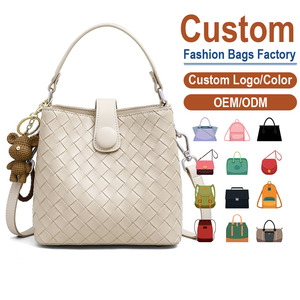 Custom Fashionable Woven PU Leather Bucket Bag Versatile Hollow-out Shoulder Tote Stylish Large Capacity Crossbody <b>Handbag</b> - Product Image 1