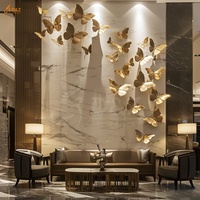 Nouvelle statue d'art mural papillon en or moderne pour l'entrée d'hôtel personnalisée Sculpture murale papillon en acier inoxydable pour la décoration publique