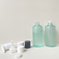 Nouvelle bouteille en plastique vert givré de 200ml avec bouchon blanc Bouteille d'emballage d'huile corporelle liquide d'essence réutilisable
