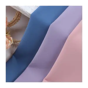 Vente en gros Tissu en nylon spandex nu de haute qualité sans couture pour femmes Pantalon en jersey de yoga à haute élasticité