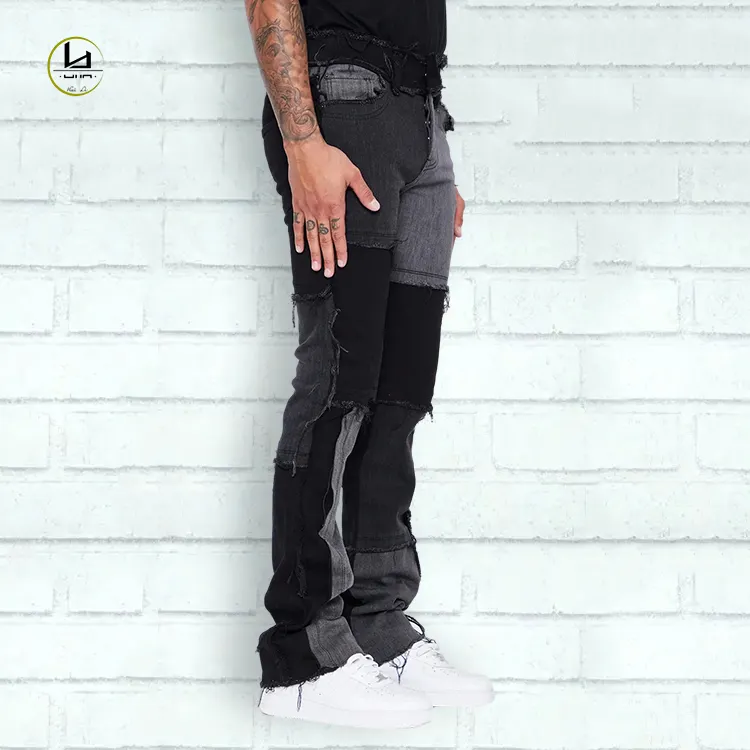HuiLi Men's fashion casual style denim pants factory sale raw edge two color block patchwork stacked jeans men flare