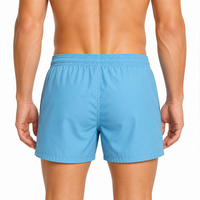 Shorts de sport décontractés pour hommes en gros, séchage rapide, taille élastique, en Spandex et Polyester, motif uni, légers, pour la natation et la plage