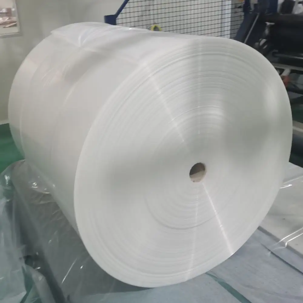 Película de envoltura de tubo de capó elástico, sistema de embalaje de capó elástico, retráctil en frío