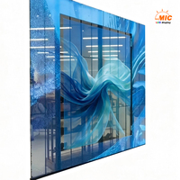 Mur vidéo LED transparent pour vitrine de magasin, grille intérieure à haute luminosité pour la publicité sur les murs en verre des centres commerciaux