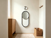 Miroir d'appoint ovale moderne, verre argenté, cadre en métal noir avec base ajourée, miroir décoratif pour chambre à coucher et salon