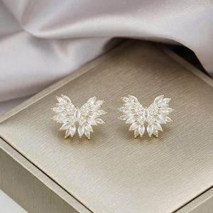 Pendientes de Botón Versátiles de Moda, Elegancia Francesa, de Alta Calidad, Nuevos al por Mayor, para Mujer, con Circonitas, Alas, Plata Tibetana, Chapados en Oro - Product Image 5