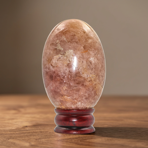 Venta al por mayor de piedra lunar de melocotón natural Shiva Lingam con soporte de oro, adorno de piedra ovalada, decoración para el hogar, coleccionable - Product Image 2