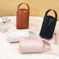 Nouvelle pochette cosmétique de luxe en cuir mini voyage portable cadeau parfum emballage sac dame étanche rouge à lèvres pochette