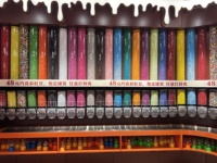 Tube acrylique personnalisé pour présentoir mural arc-en-ciel de confiserie avec distributeurs à gravité et bacs