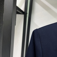 Ensemble tailleur deux pièces OUDINA tendance pour femme : blazer élégant en laine mélangée à col en V et garniture en dentelle, et mini-jupe