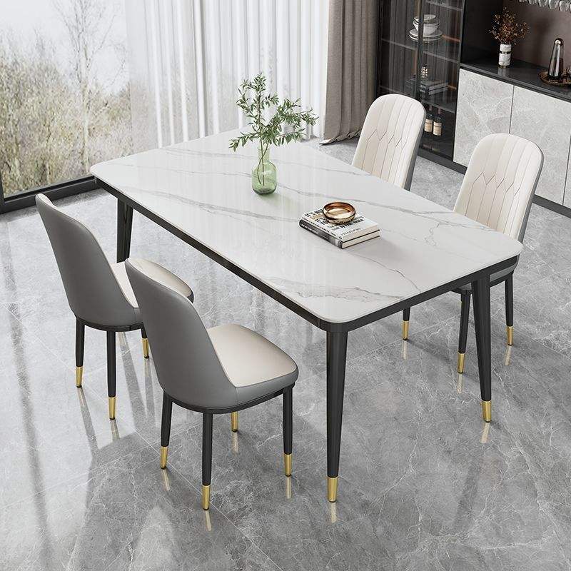 Table simple avec 4 chaises [devant blanc, dos gris]