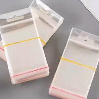 Sac en plastique BOPP auto-adhésif de taille personnalisable avec OPP transparent transparent pour l'emballage de vêtements et de cadeaux thermoscellable
