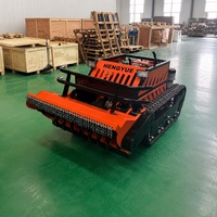 Coupe-herbe télécommandé sur chenilles avec générateur 5000W, portée de 680m et contrôle de hauteur du plateau à distance