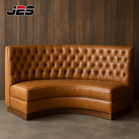 Ensemble de mobilier commercial J2S : banquette en cuir, table et chaises de restaurant en marbre blanc et noir, canapé pour restaurant et café
