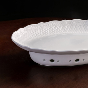 Plato de cerámica para pescado de la serie White Moonlight, ovalado de 16 pulgadas con base para calentar en el hogar y uso en restaurantes. - Product Image 1