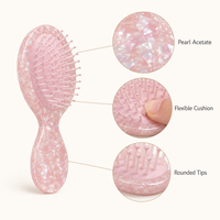 Brosse à cheveux démêlante portable en acétate nacré de 14 cm avec coussin d'air, personnalisable avec logo, cadeau idéal pour femme - Vente en gros Ume