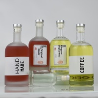 Botol Minuman Keras Kaca Buram Bulat Custom 100ml-1000ml dengan Tutup untuk Kemasan Vodka Whisky Brandy Cina