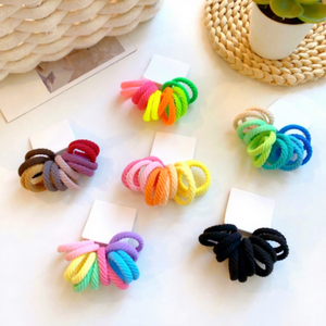 ยางรัดผมขนาดเล็กแบบยืดหยุ่น 12 ชิ้น/ชุด ขายส่ง สำหรับผู้หญิงและเด็ก สีลูกกวาด ยางรัดผมสีสันสดใส - Product Image 1