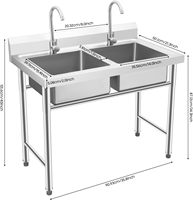 Évier de cuisine commercial autoportant à double bac en acier inoxydable avec robinet rotatif à 360 degrés pour usage en garage