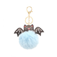 Vente en gros de porte-clés de Noël en peluche pour Halloween, boule bouffante en fourrure PU avec pompon et chauve-souris en alliage de zinc, porte-clés, pendentif à breloque pour