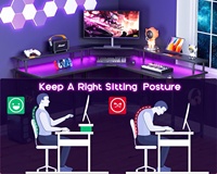 Échantillon gratuit DDP Drop 1 pièce Bureau de jeu noir en forme de L avec lumières LED Prises de courant Bureau d'angle avec porte-gobelet